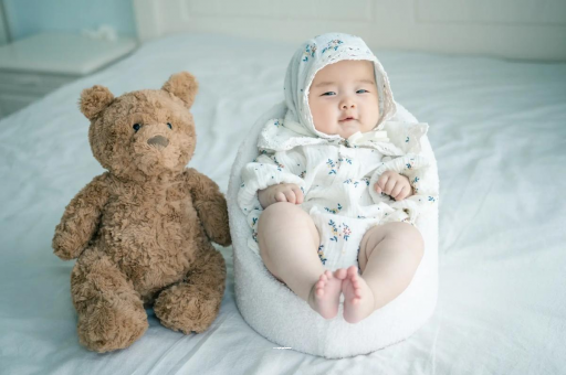 烟台宝宝吐奶是什么原因